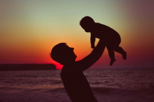 dad and baby in sunset