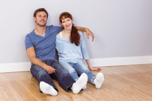 happy couple on floor